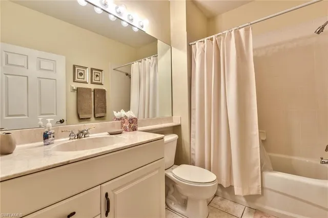 a bathroom with a sink a toilet and a bathtub