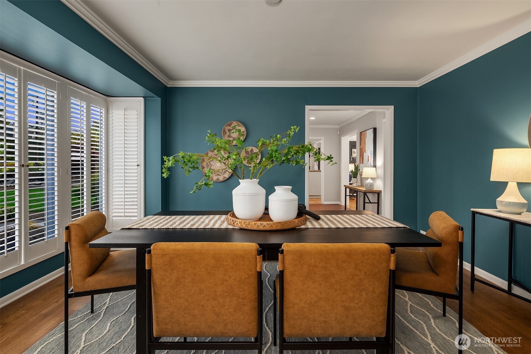 640 Alverson Boulevard Everett, WA 98201 - Photo 14 of 40 a view of a dining room with furniture and a potted plant