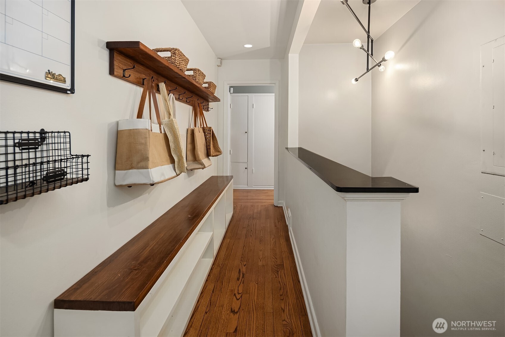 640 Alverson Boulevard Everett, WA 98201 - Photo 19 of 40 a hallway with stairs and wooden floor