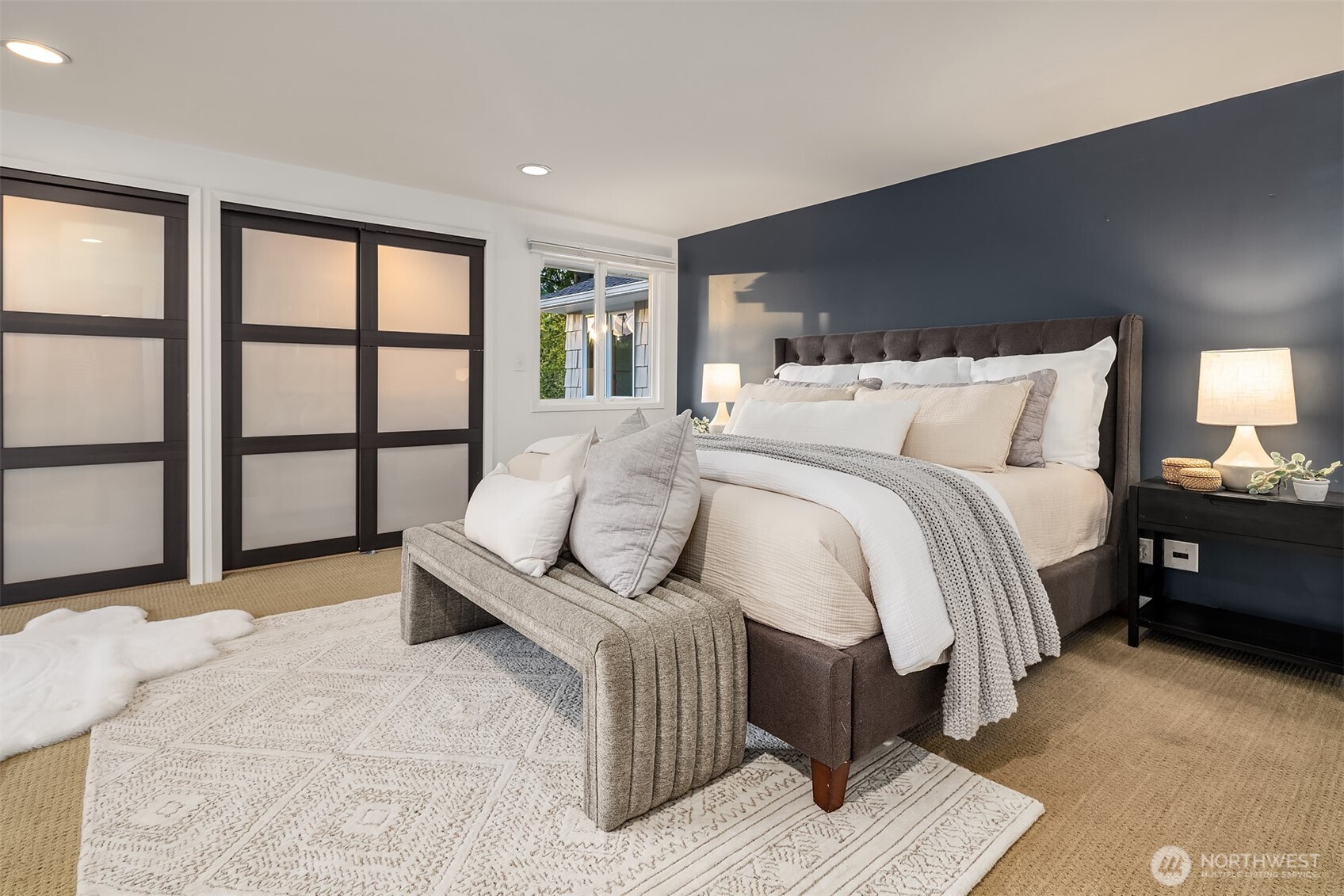 640 Alverson Boulevard Everett, WA 98201 - Photo 20 of 40 a bedroom with a large bed and a large window