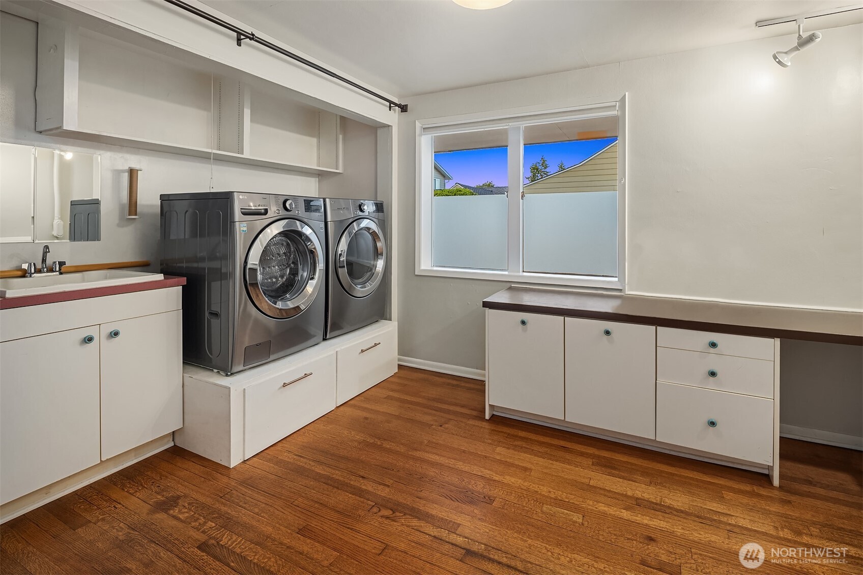 640 Alverson Boulevard Everett, WA 98201 - Photo 24 of 40 a kitchen with cabinets and wooden floor