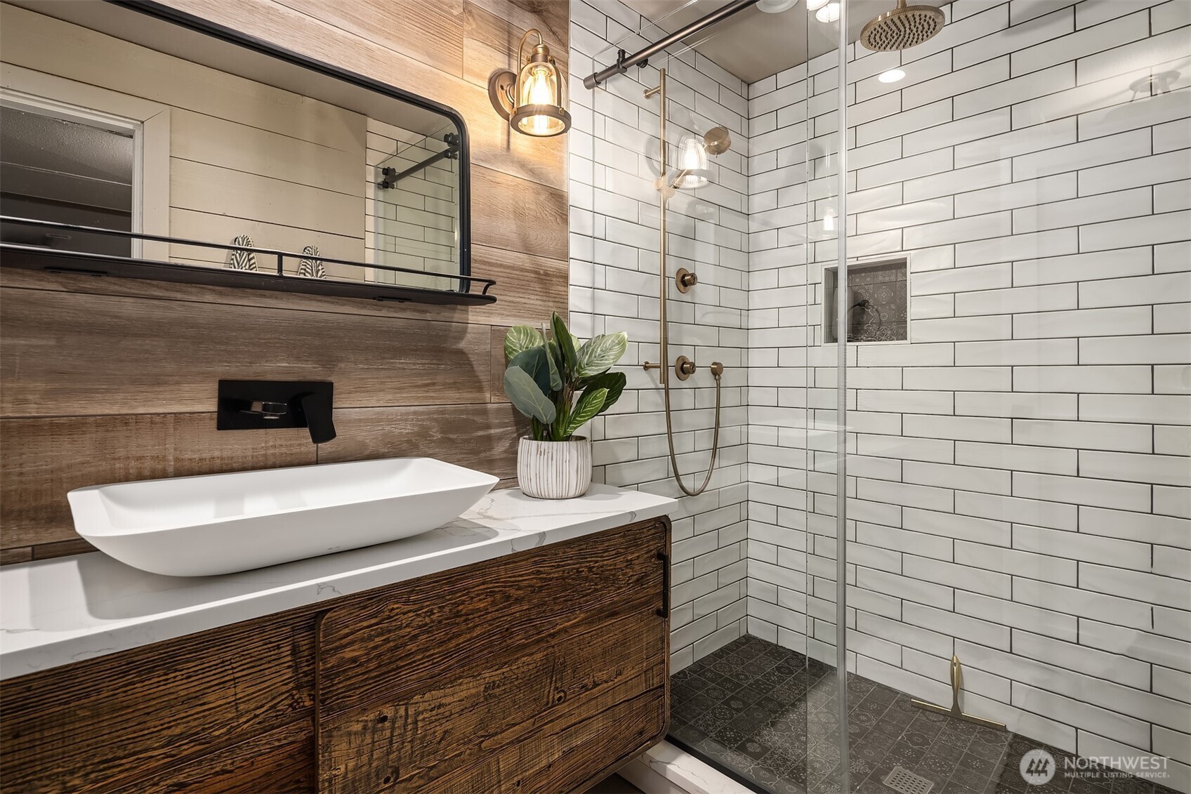 640 Alverson Boulevard Everett, WA 98201 - Photo 35 of 40 a bathroom with a sink a mirror and shower