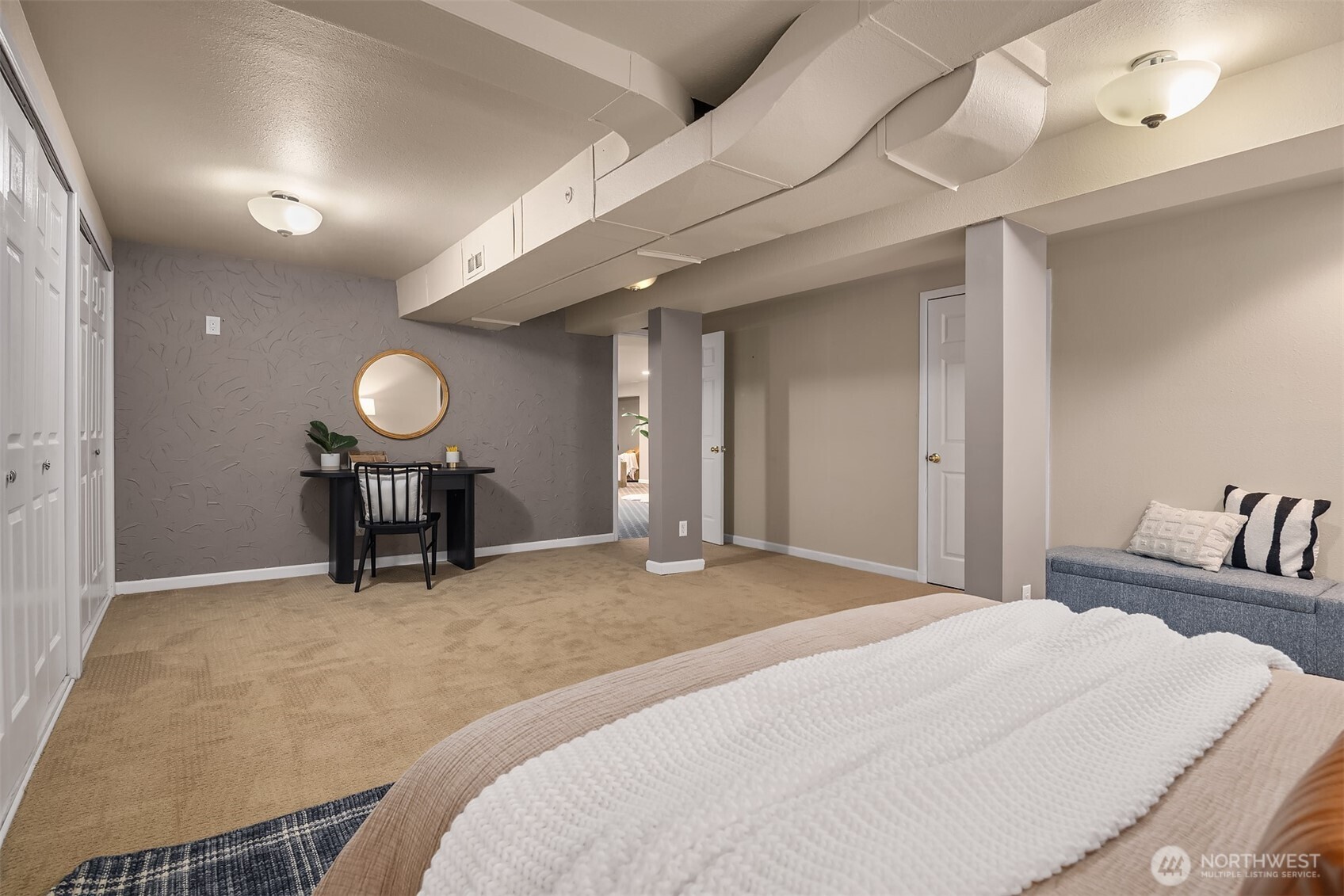 640 Alverson Boulevard Everett, WA 98201 - Photo 37 of 40 a bedroom with bed and cabinets