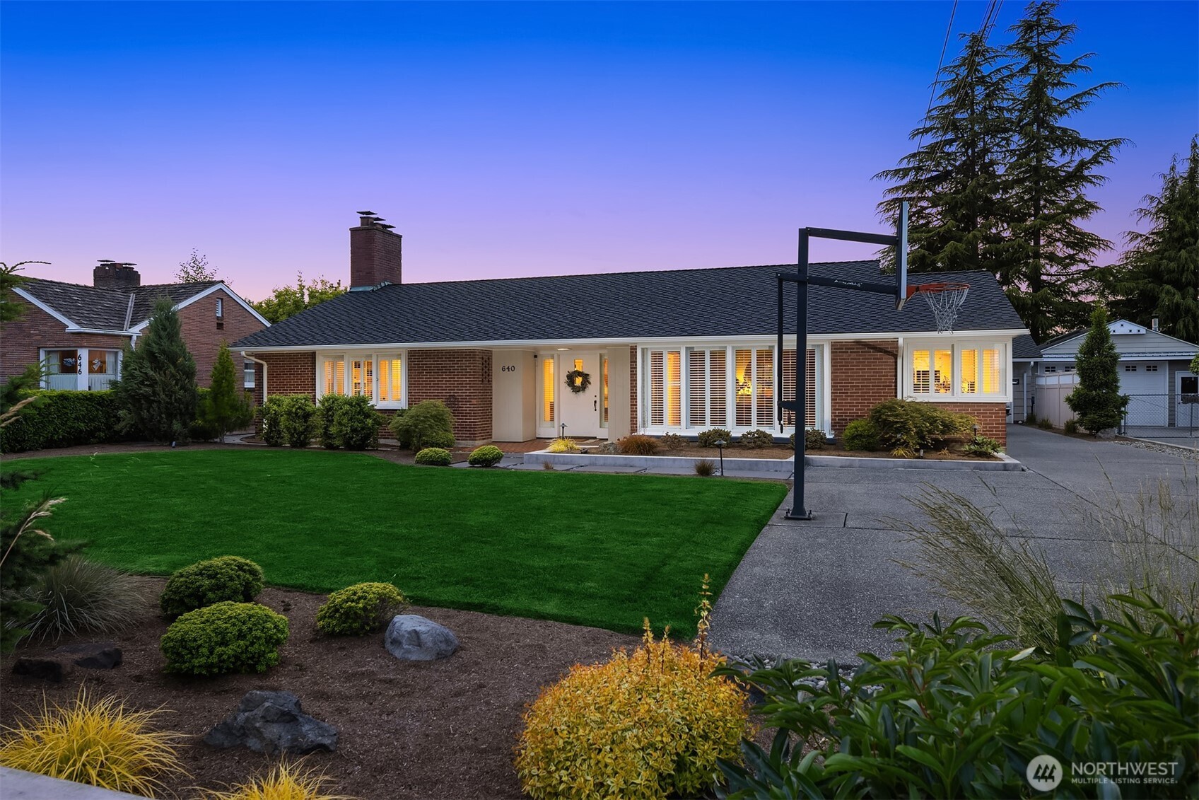 640 Alverson Boulevard Everett, WA 98201 - Photo 40 of 40 a front view of a house with a yard and garden