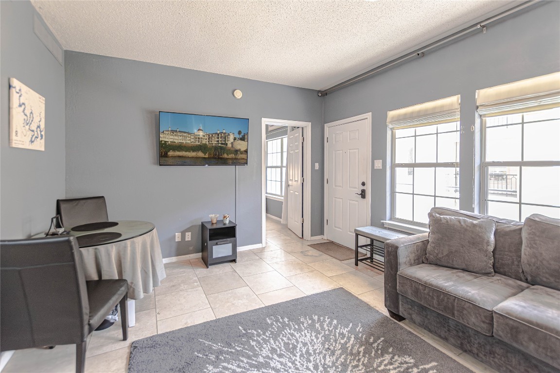 3404 American Drive, Unit 3226 Lago Vista, TX 78645 - Photo 11 of 40 a living room with furniture and a window