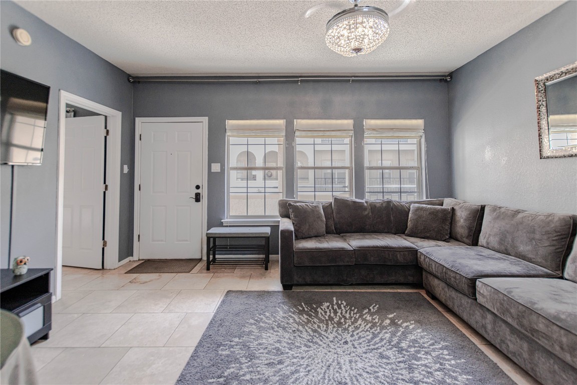 3404 American Drive, Unit 3226 Lago Vista, TX 78645 - Photo 13 of 40 a living room with furniture and a window