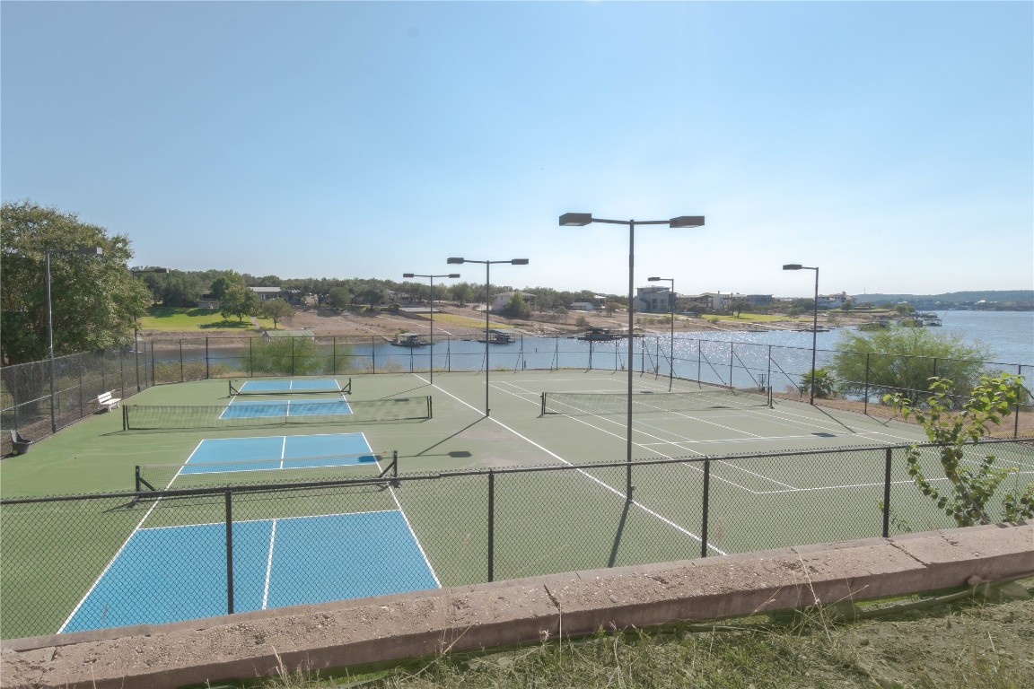 3404 American Drive, Unit 3226 Lago Vista, TX 78645 - Photo 29 of 40 a view of a tennis court