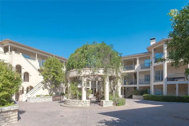 a view of a building with a street