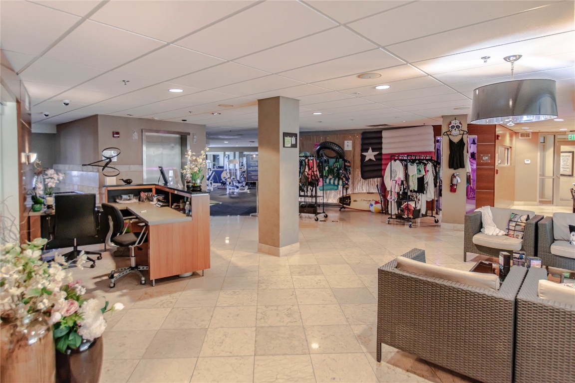 3404 American Drive, Unit 3226 Lago Vista, TX 78645 - Photo 33 of 40 a living room with lots of furniture and kitchen view
