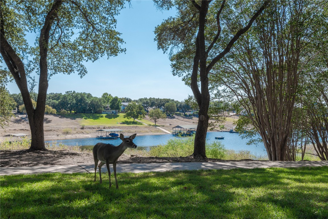 3404 American Drive, Unit 3226 Lago Vista, TX 78645 - Photo 7 of 40 a view of pool table and chairs