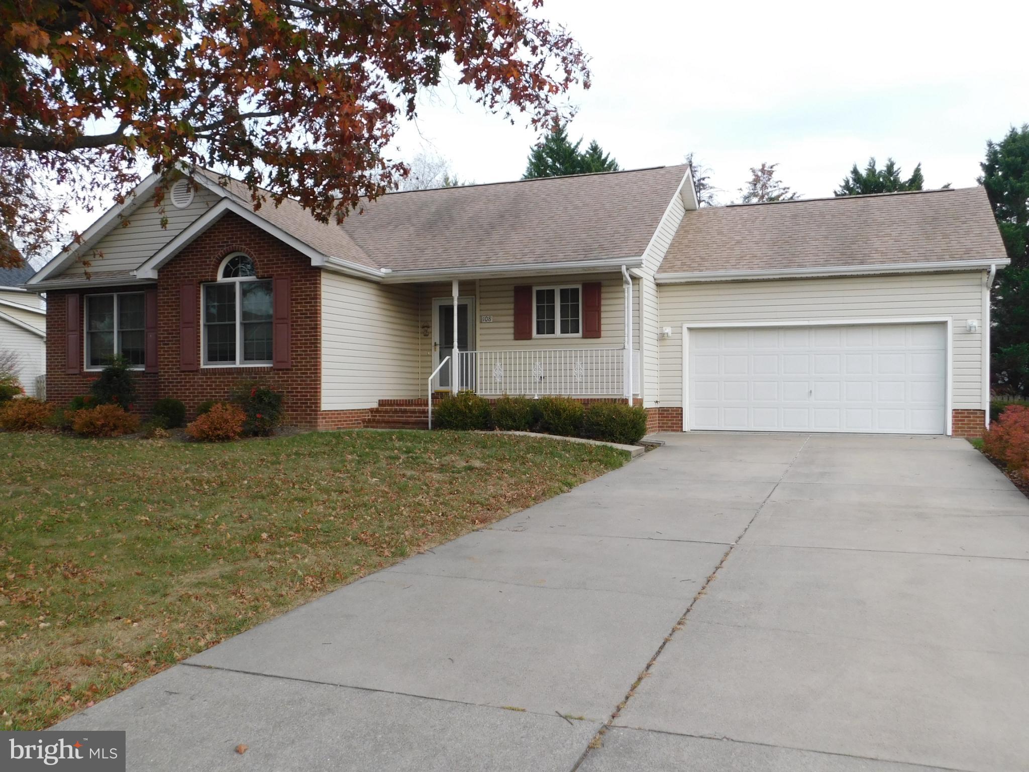 108 Senseny Glen Drive Winchester, VA 22602 - Photo 1 of 24 a front view of a house with a yard and garage