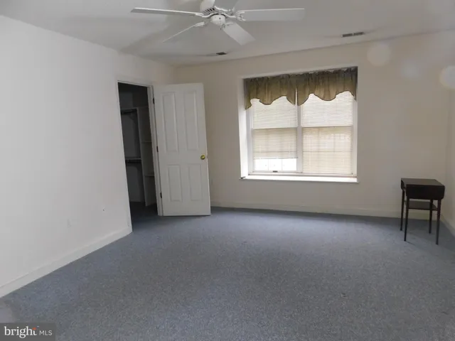 an empty room with a window