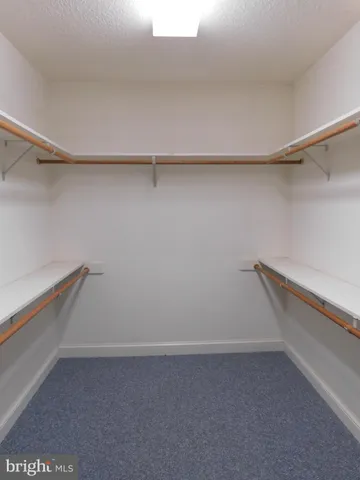 a view of a room with racks on the wall