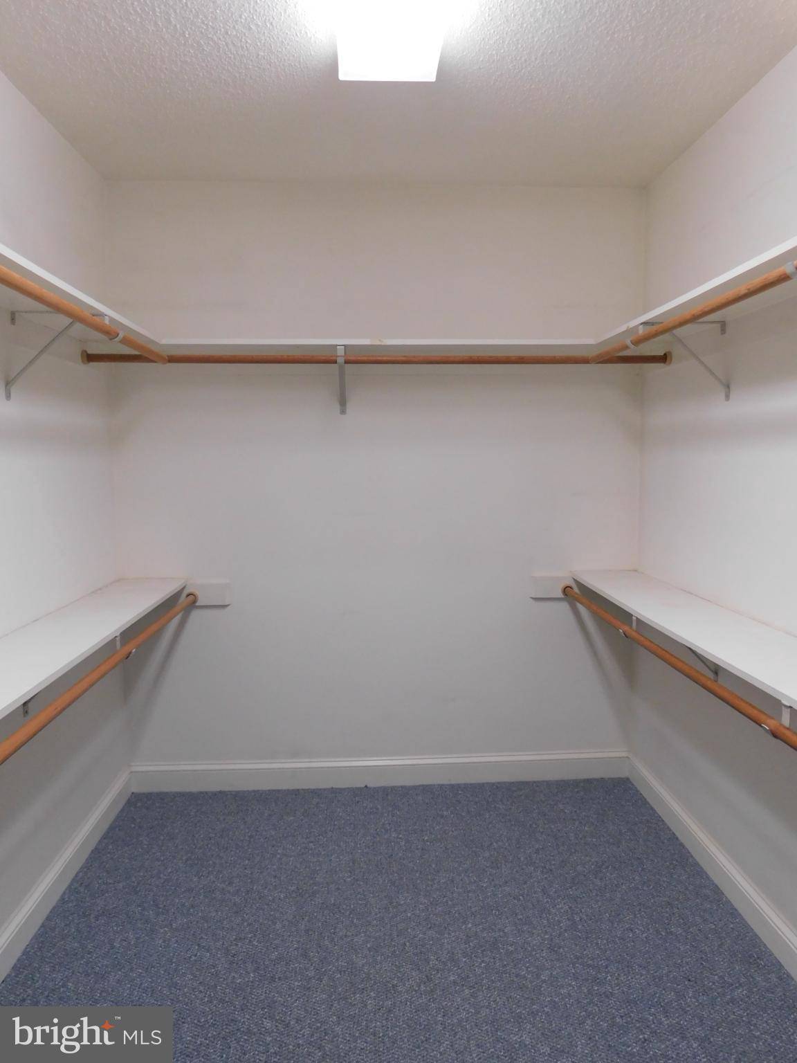 108 Senseny Glen Drive Winchester, VA 22602 - Photo 17 of 24 a view of a room with racks on the wall