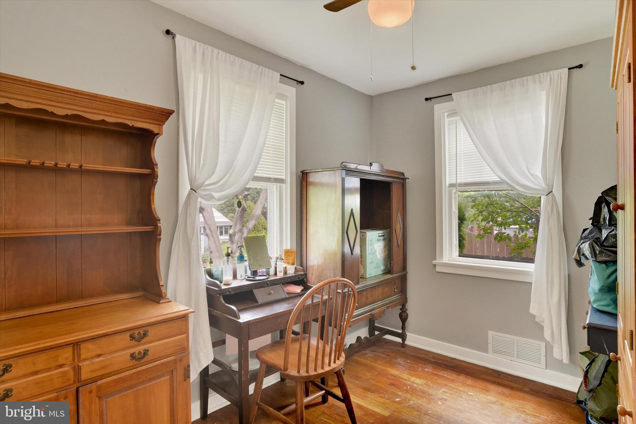 4712 Ruth Ann Street Harrisburg, PA 17109 - Photo 15 of 26 a view of a dining room with furniture window and wooden floor