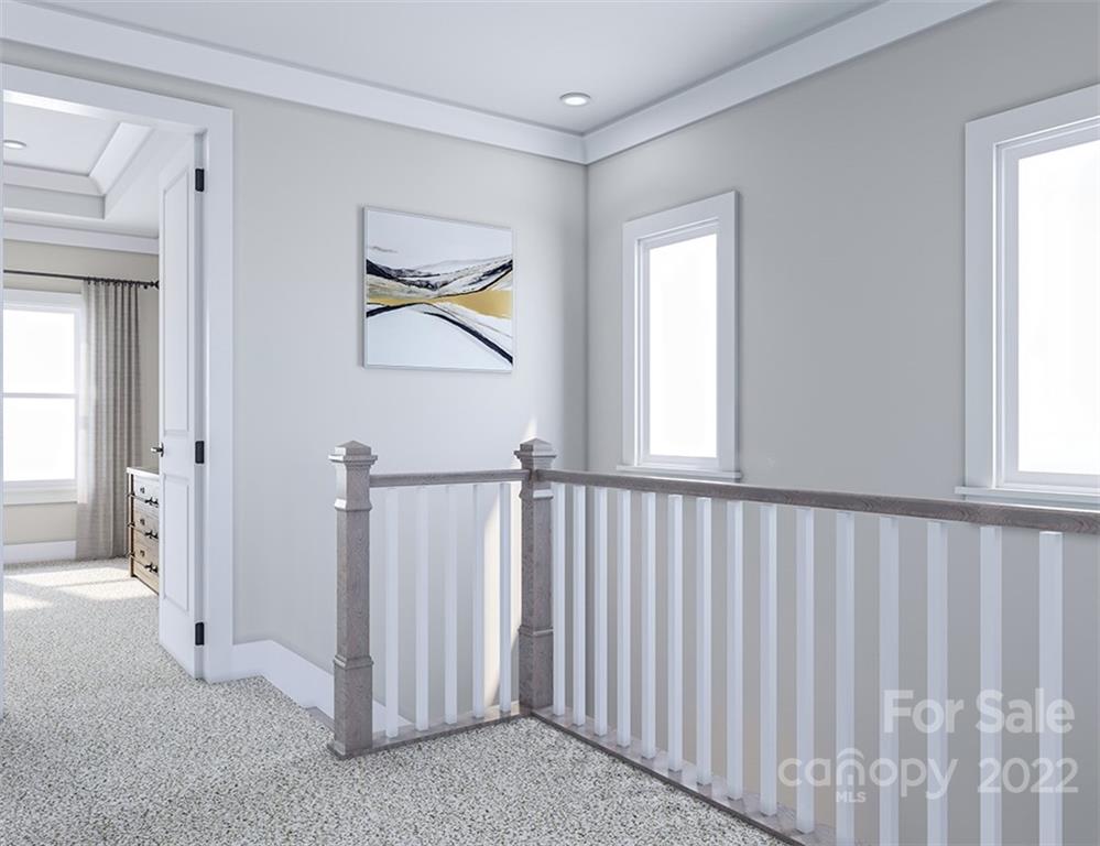 642 East Woodlawn Road Charlotte, NC 28209 - Photo 12 of 27 a view of a hallway with windows and entryway