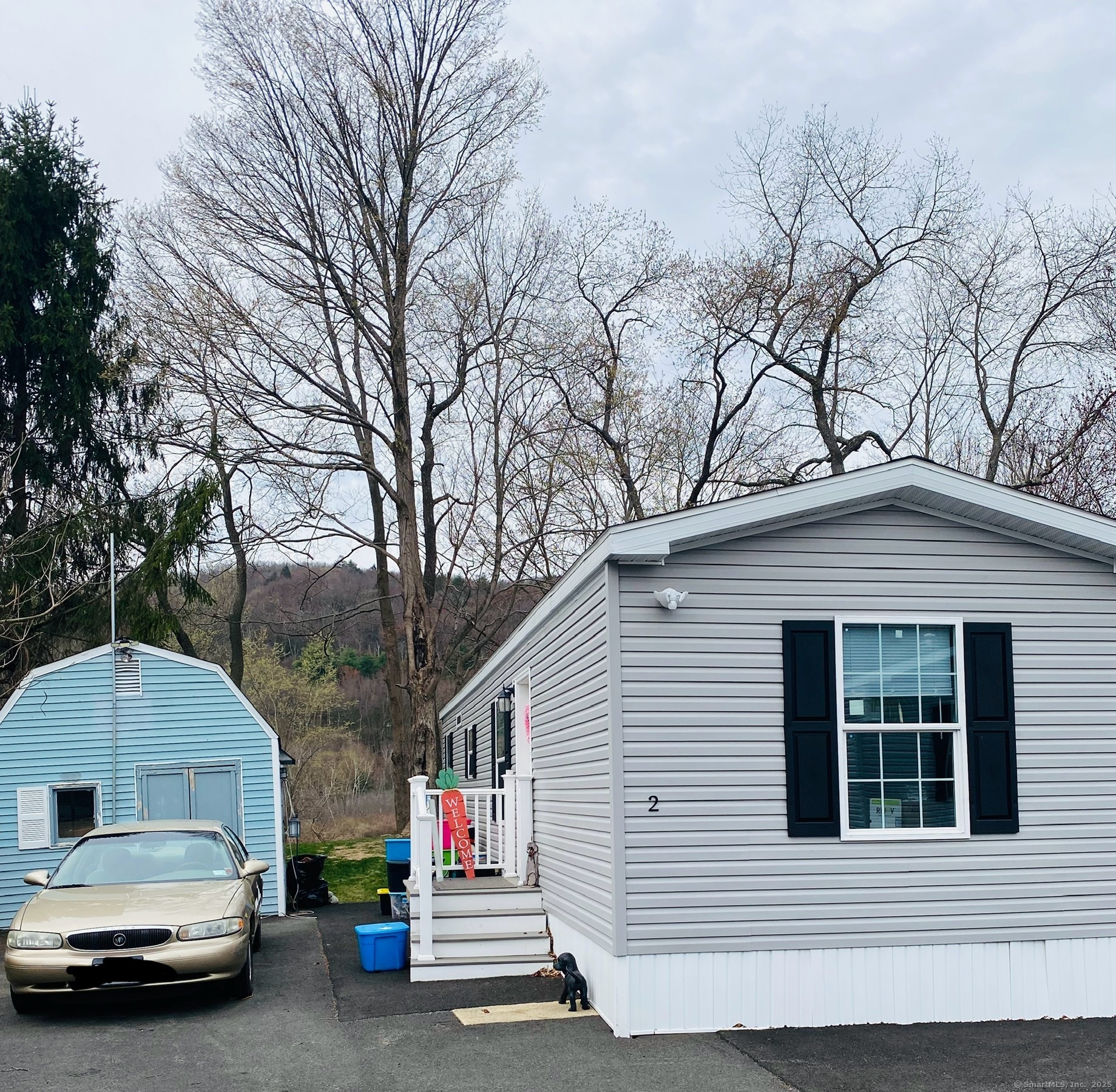 a view of car parked in front of house