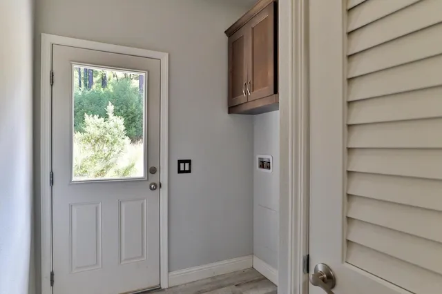 a view of a park with large trees