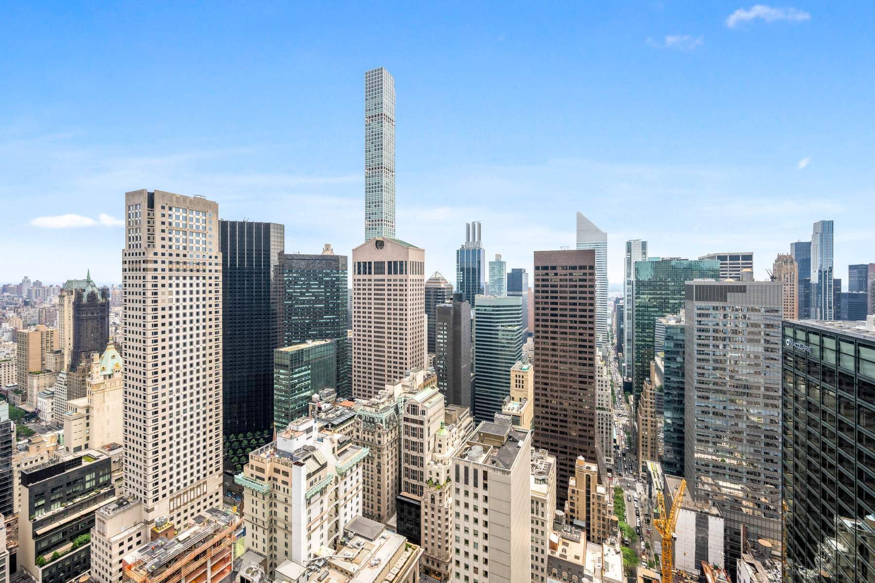 15 West 53rd Street, Unit 49BC Manhattan, NY 10019 - Photo 11 of 12 a view of city with tall buildings