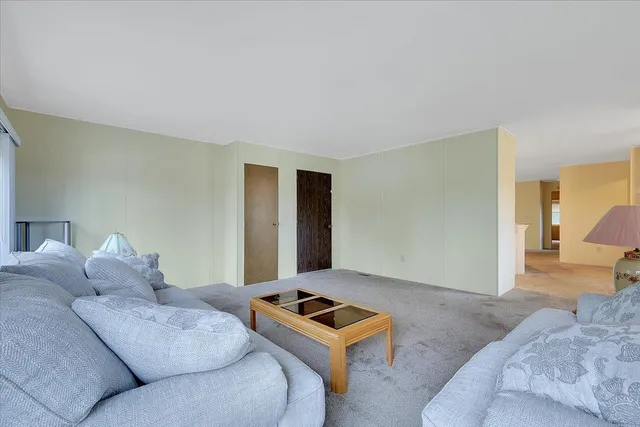 a living room with furniture and a couch