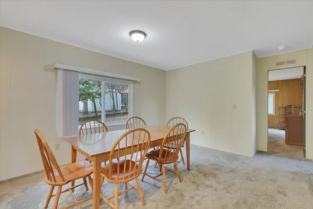 a table and chairs in a room