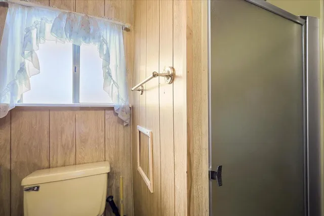 a bathroom with a shower curtain