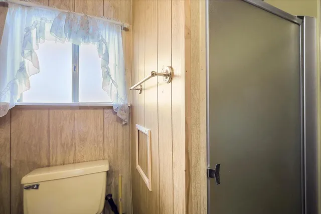 a bathroom with a shower curtain