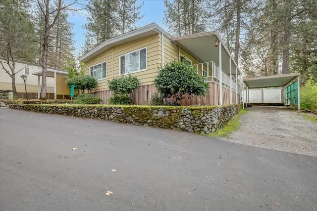 a view of a house with a street