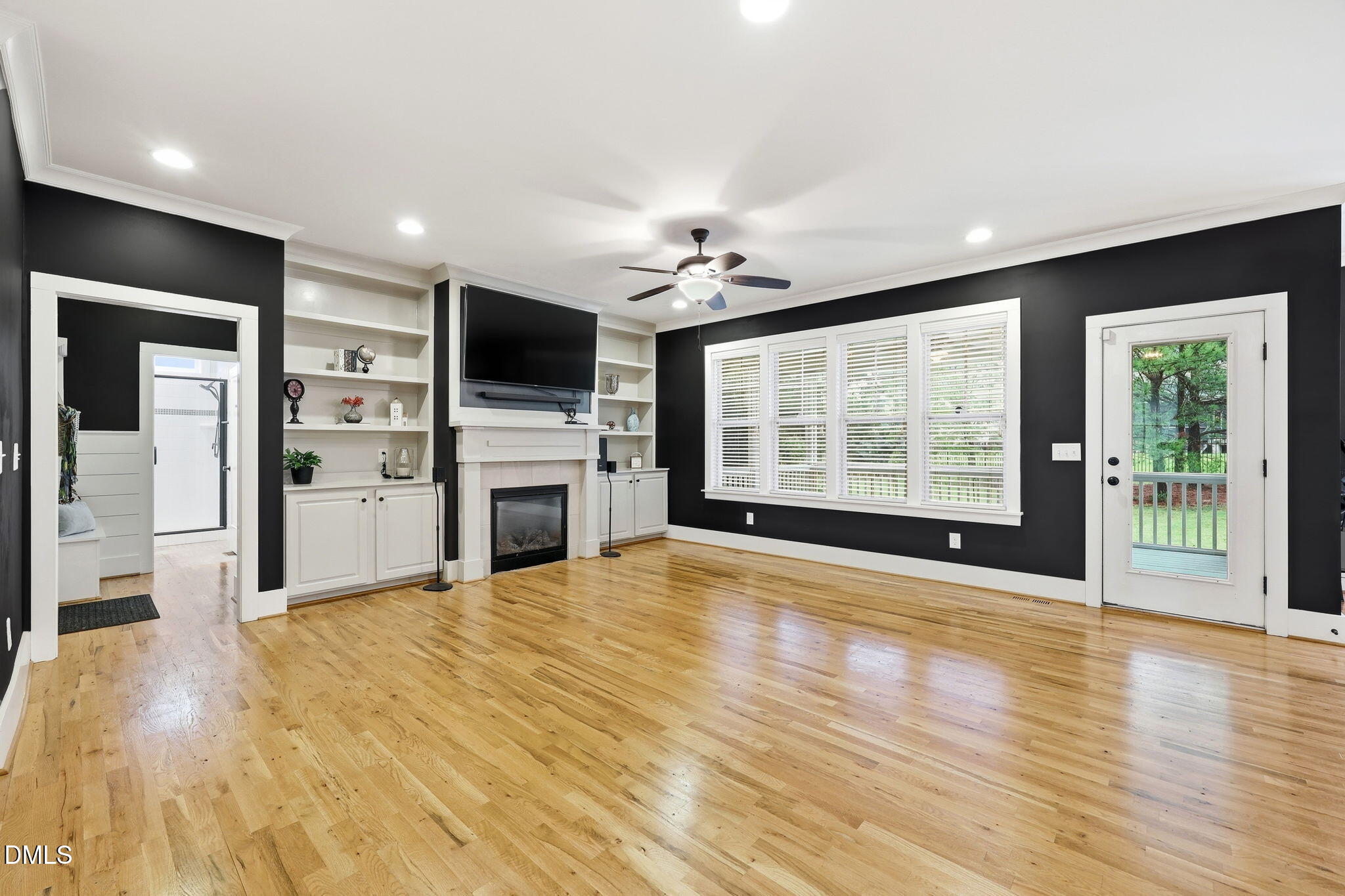 220 Character Drive Rolesville, NC 27571 - Photo 17 of 62 Family Room & door to Screened Porch