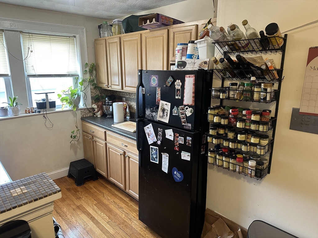 38 Day Street, Unit 20 Somerville, MA 02144 - Photo 7 of 9 a kitchen with lots of counter top space