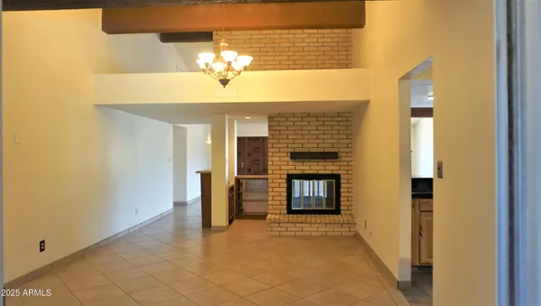 a view of a livingroom with a fireplace