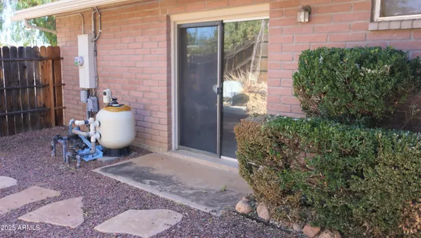 a view of balcony with a small swimming pool