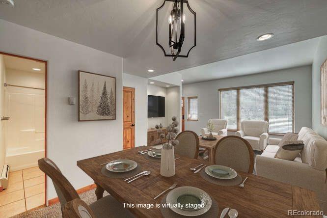 138 North M Street, Unit C Salida, CO 81201 - Photo 11 of 47 a view of a dining room with furniture window and outside view