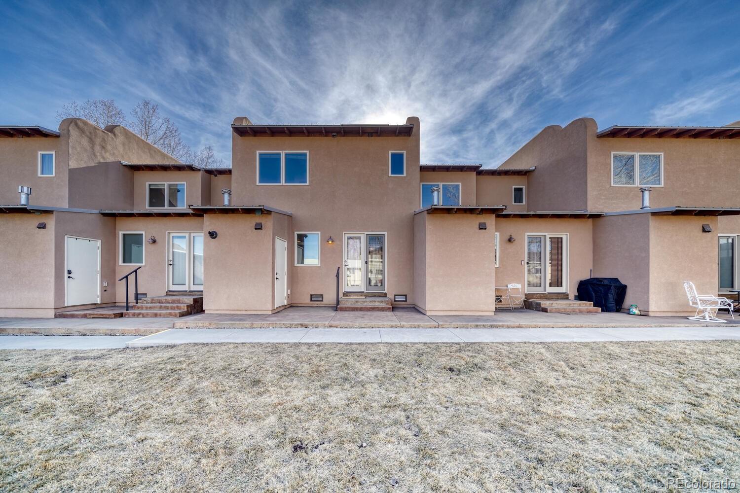 138 North M Street, Unit C Salida, CO 81201 - Photo 34 of 47 a view of a house with a sink and a yard