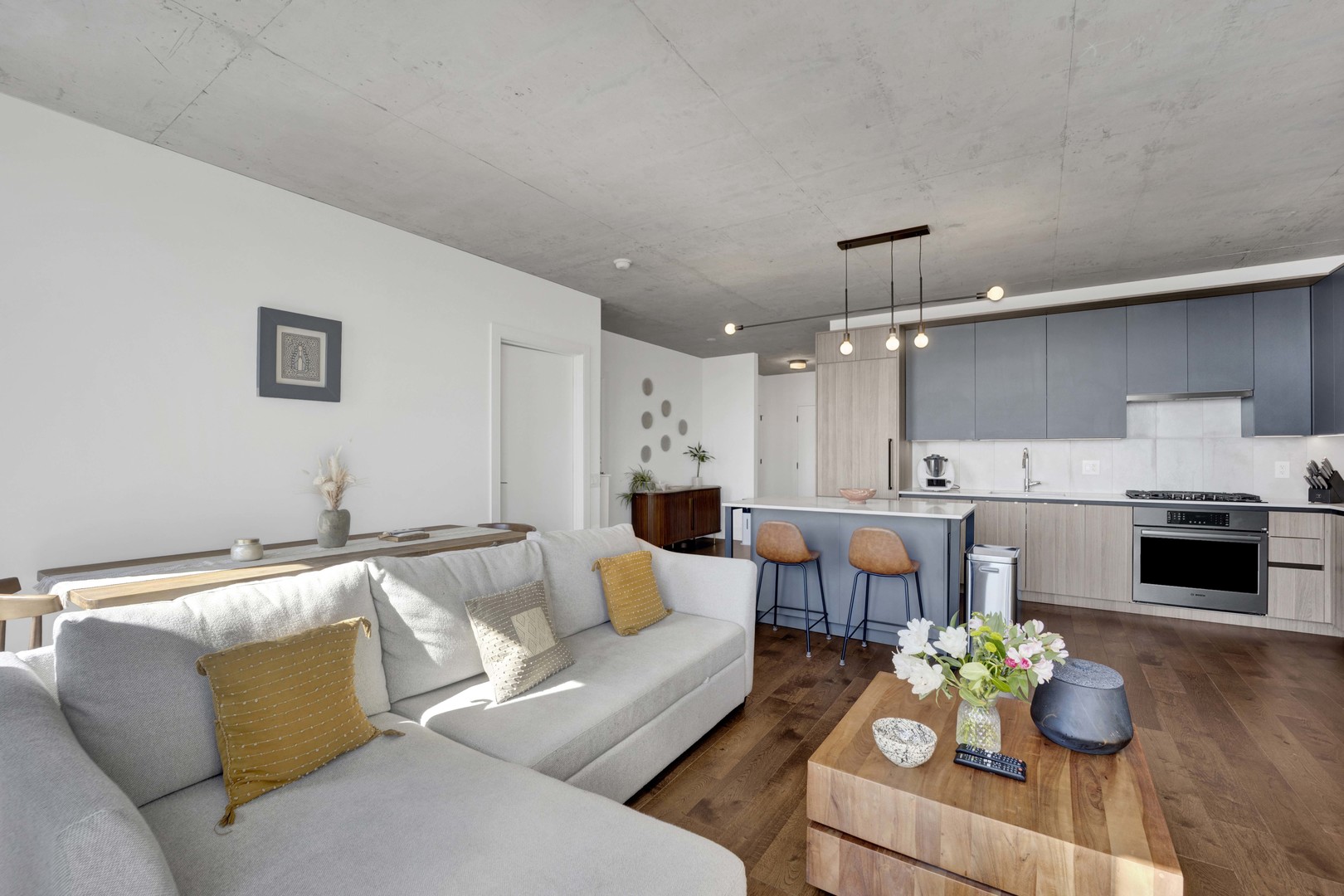 234 West Polk Street, Unit 2903 Chicago, IL 60607 - Photo 6 of 39 a living room with furniture and a fireplace