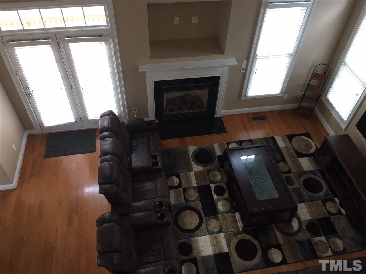 105 Fort Jackson Road Morrisville, NC 27560 - Photo 12 of 18 a living room with furniture and a fireplace