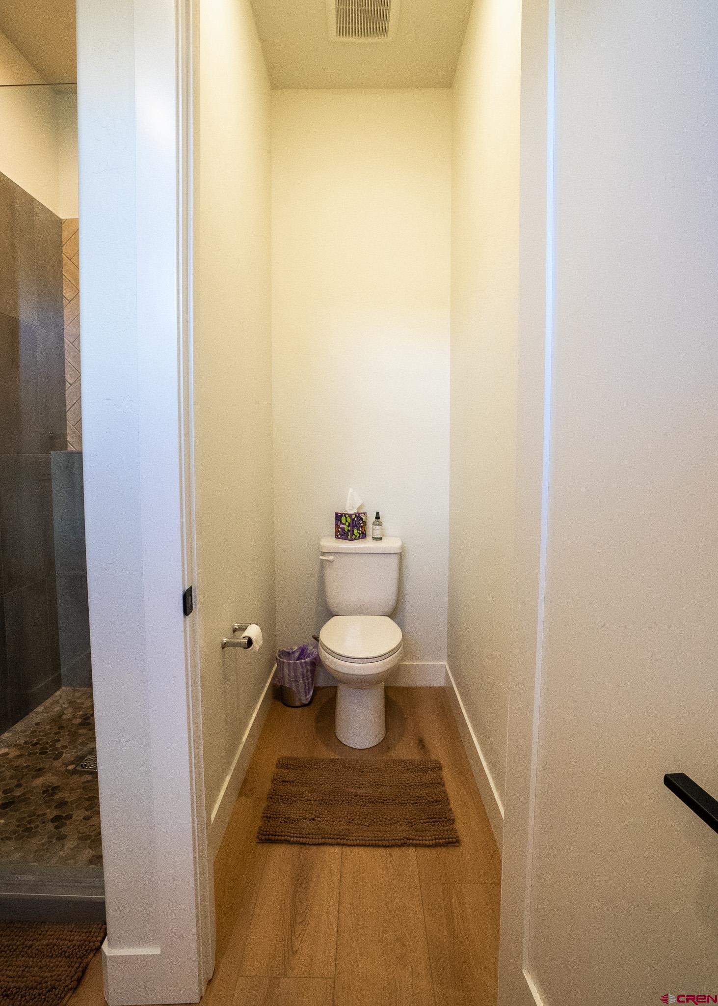 236 Via Tuscana Durango, CO 81301 - Photo 20 of 31 a bathroom with a toilet and a shower