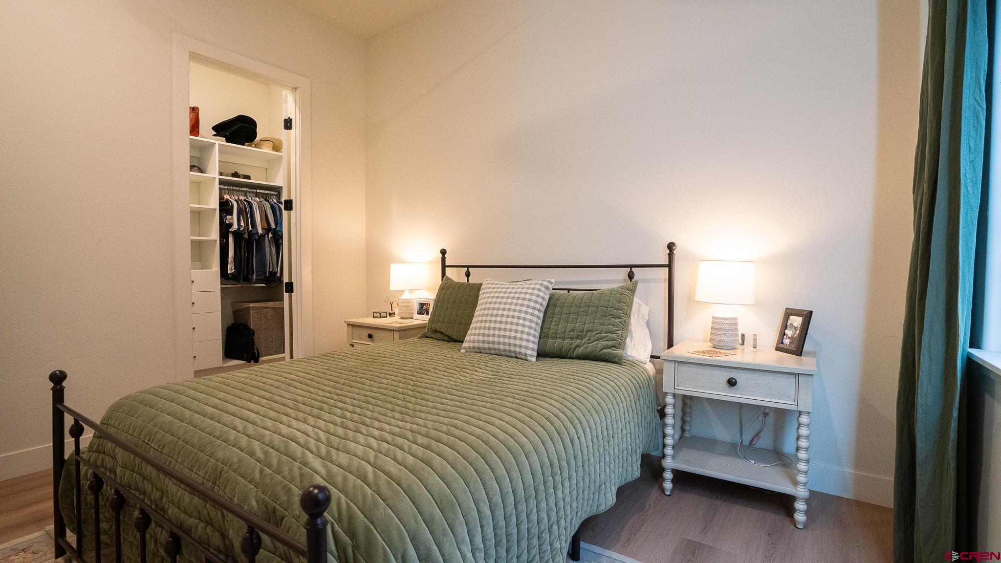 236 Via Tuscana Durango, CO 81301 - Photo 22 of 31 a bedroom with a bed and cabinets