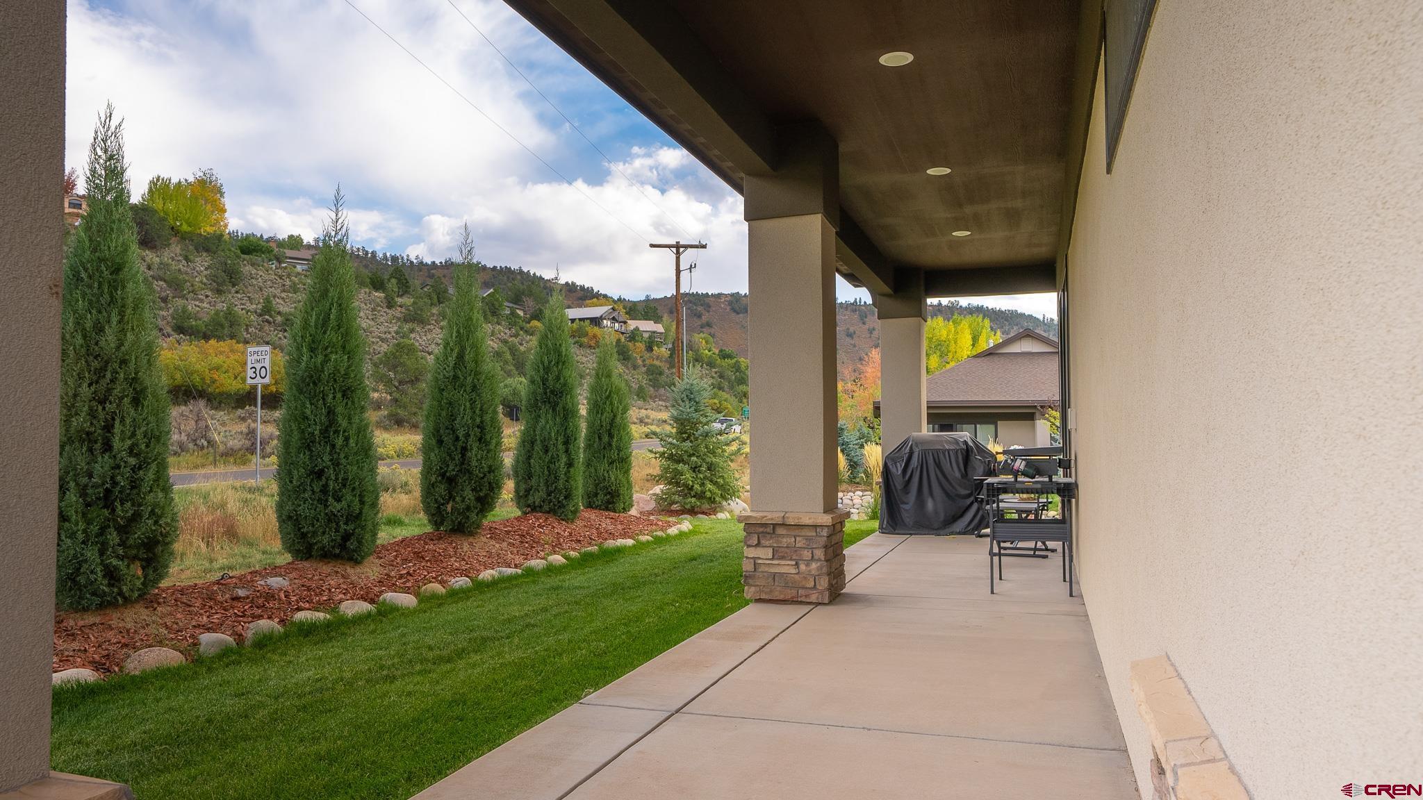 236 Via Tuscana Durango, CO 81301 - Photo 26 of 31 a view of a porch with chairs and backyard