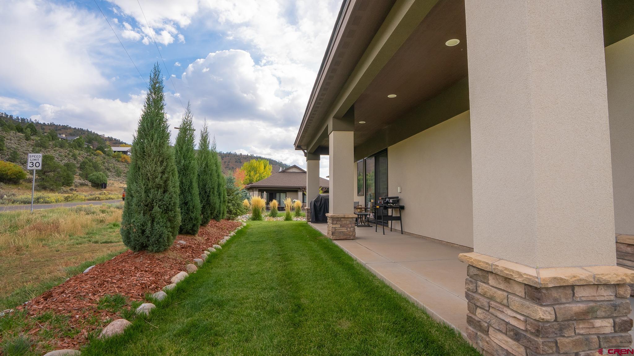 236 Via Tuscana Durango, CO 81301 - Photo 27 of 31 a front view of a house with a yard