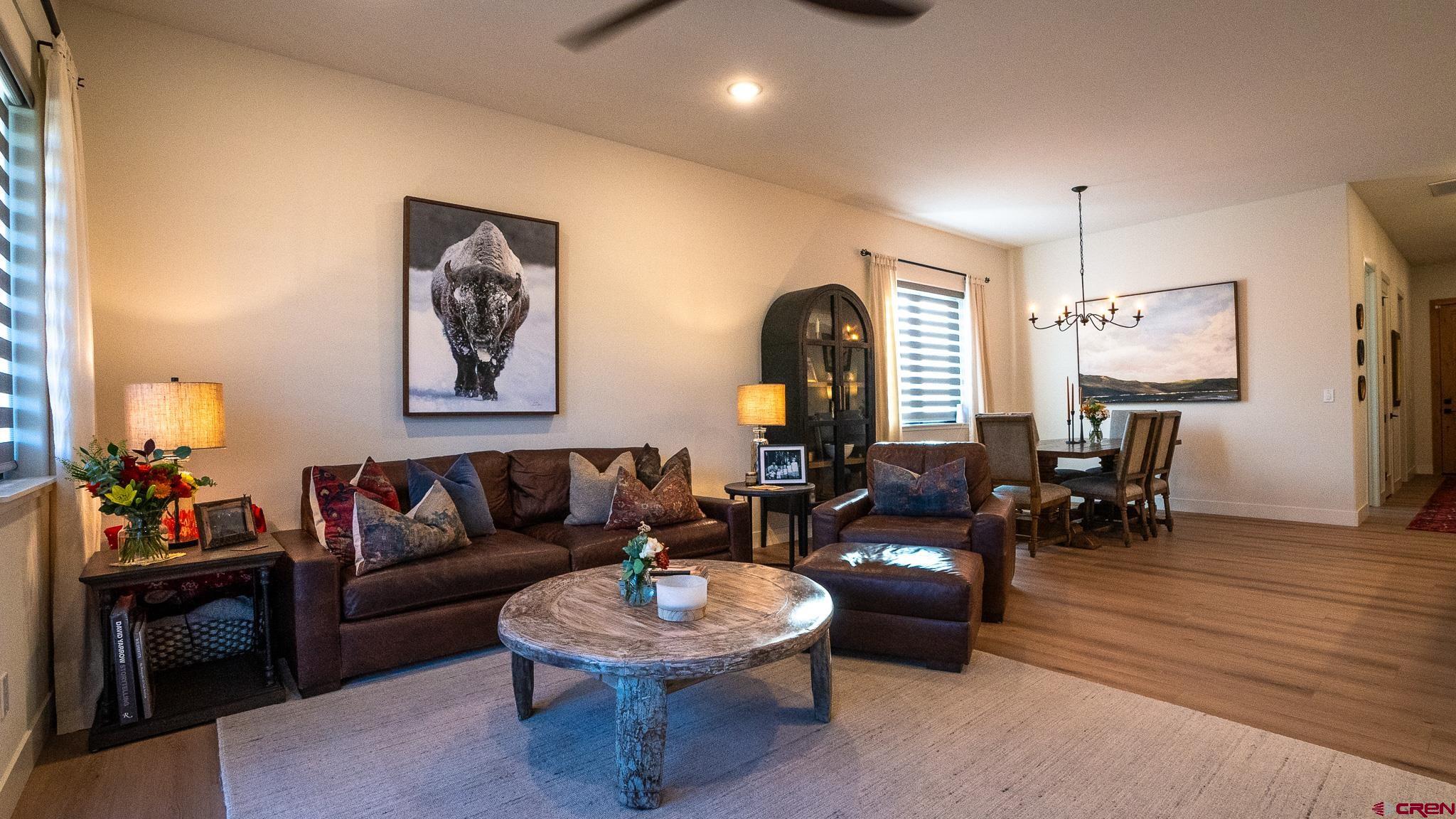236 Via Tuscana Durango, CO 81301 - Photo 3 of 31 a living room with furniture and wooden floor