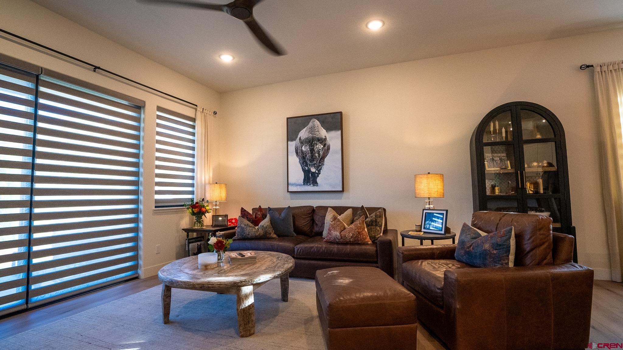 236 Via Tuscana Durango, CO 81301 - Photo 5 of 31 a living room with furniture and a large window