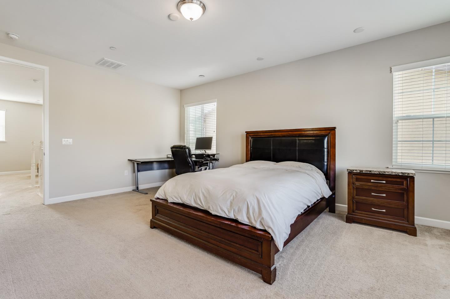 333 Calle Cerro Morgan Hill, CA 95037 - Photo 25 of 45 a bedroom with a bed and window