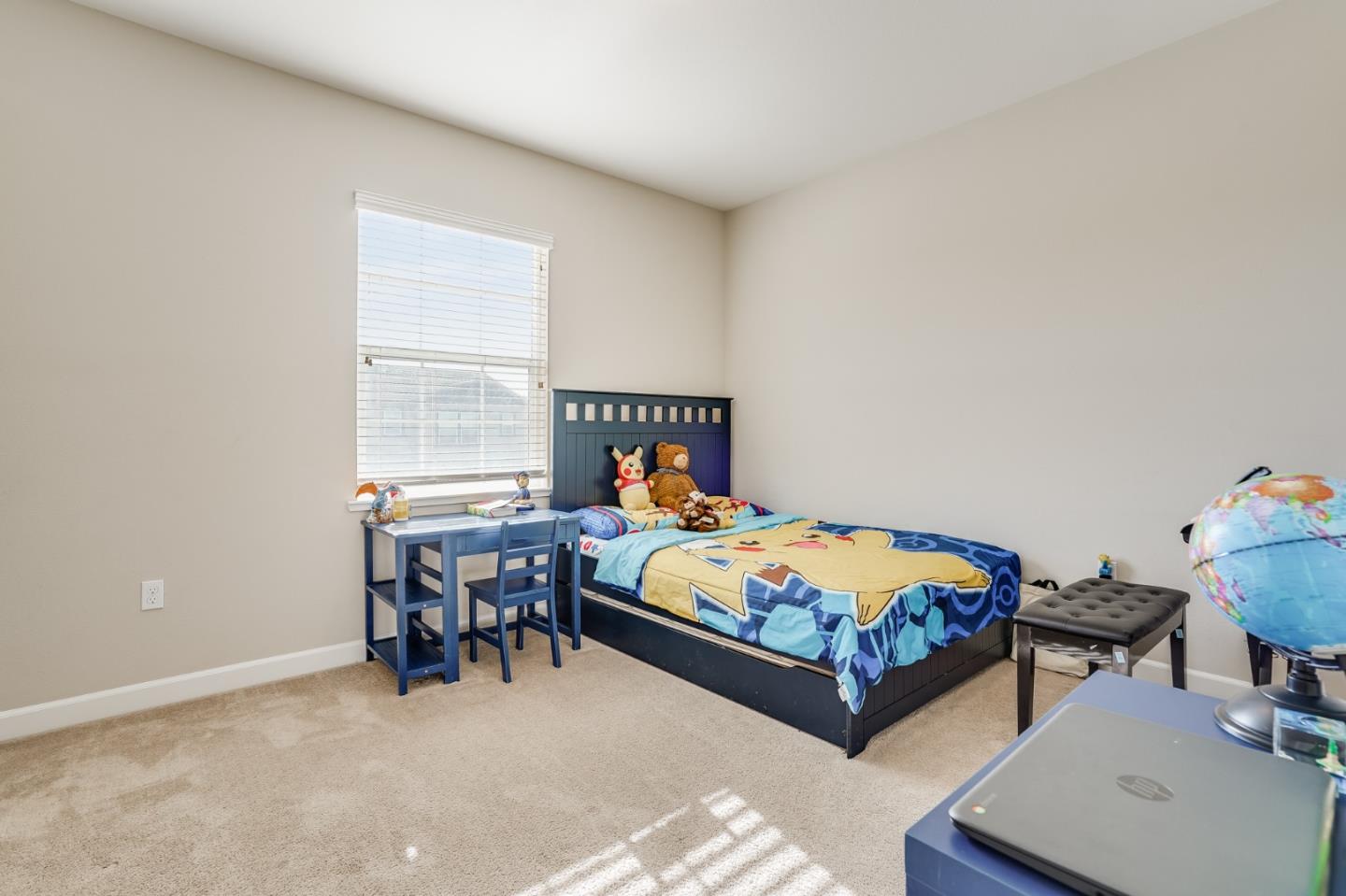 333 Calle Cerro Morgan Hill, CA 95037 - Photo 33 of 45 a bedroom with a bed and a table in it