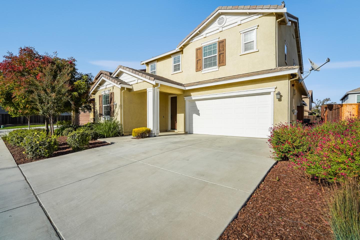 333 Calle Cerro Morgan Hill, CA 95037 - Photo 37 of 45 a front view of a house with a yard and a garage