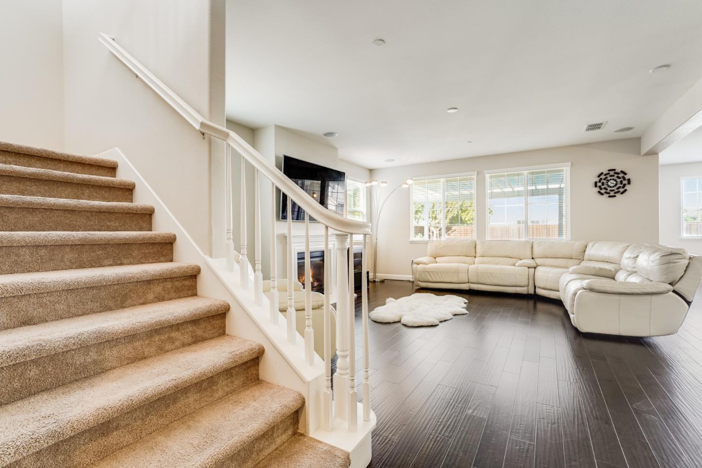 333 Calle Cerro Morgan Hill, CA 95037 - Photo 5 of 45 a living room with furniture and a wooden floor