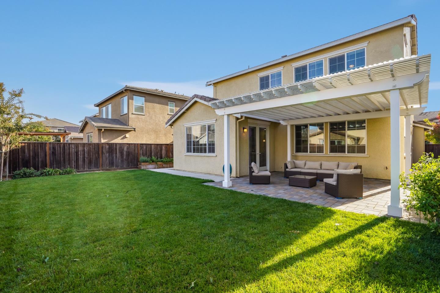 333 Calle Cerro Morgan Hill, CA 95037 - Photo 42 of 45 a front view of a house with patio and garden
