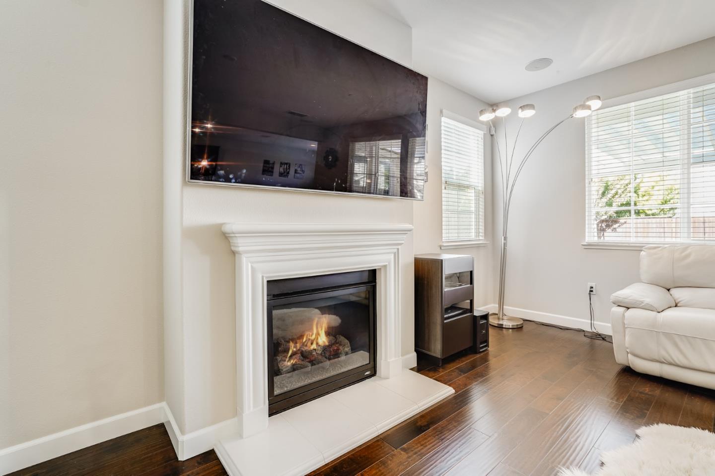 333 Calle Cerro Morgan Hill, CA 95037 - Photo 9 of 45 a living room with furniture and a fireplace