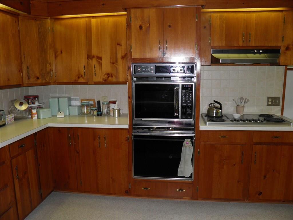 2468 Rangeley Road Phillips, ME 04966 - Photo 4 of 36 The kitchen with a cook top and a...