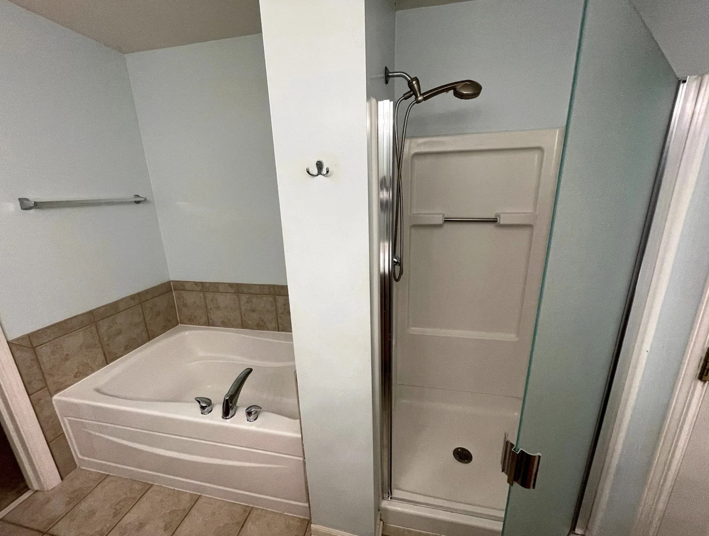 2326 Sunshine Lane Aurora, IL 60503 - Photo 16 of 27 a bathroom with a tub and a shower